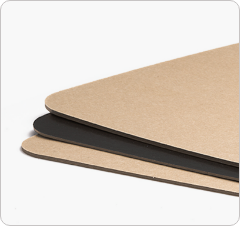 three sheets of overlapping compressed board in tan and black