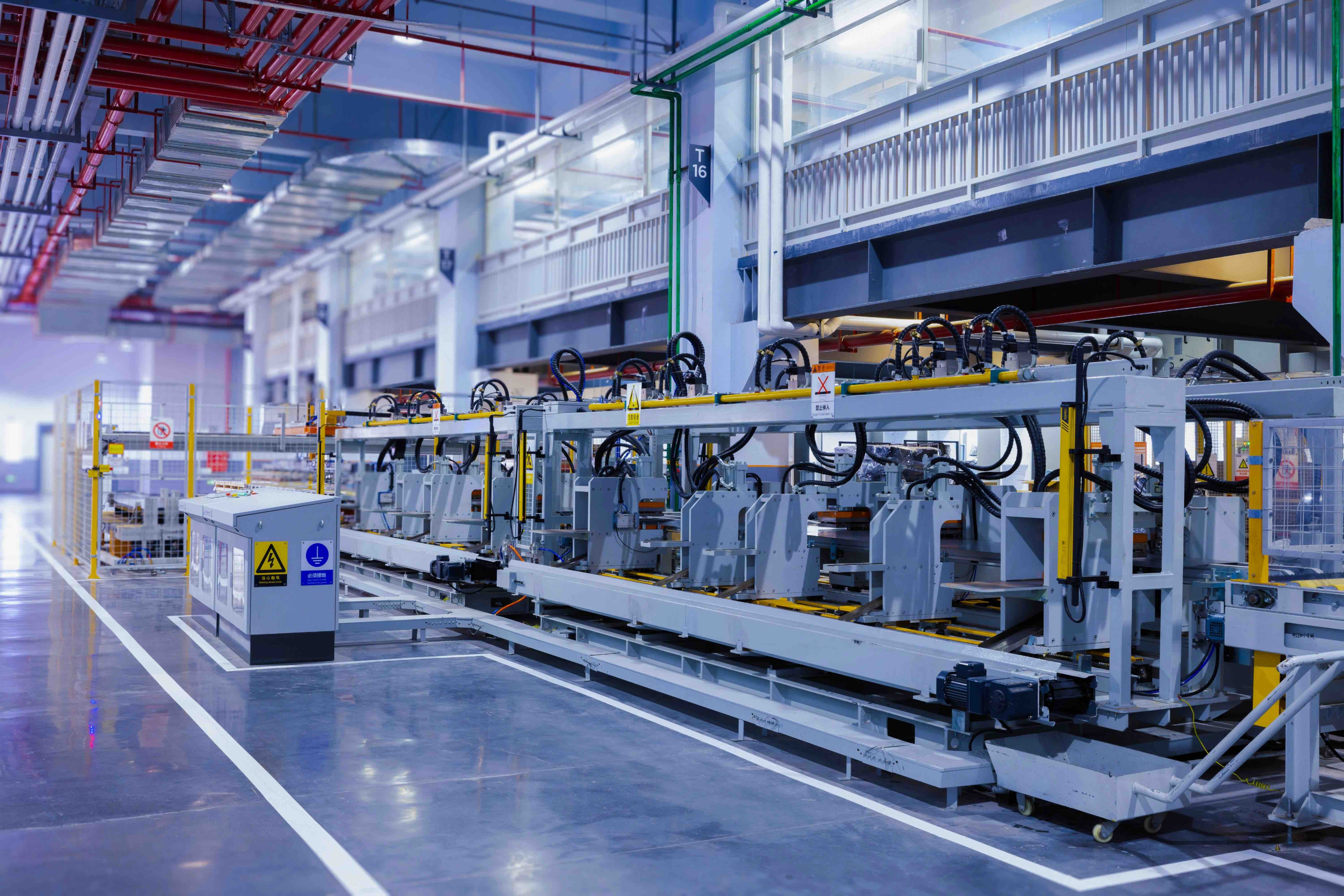inside of an industrial warehouse with machinery