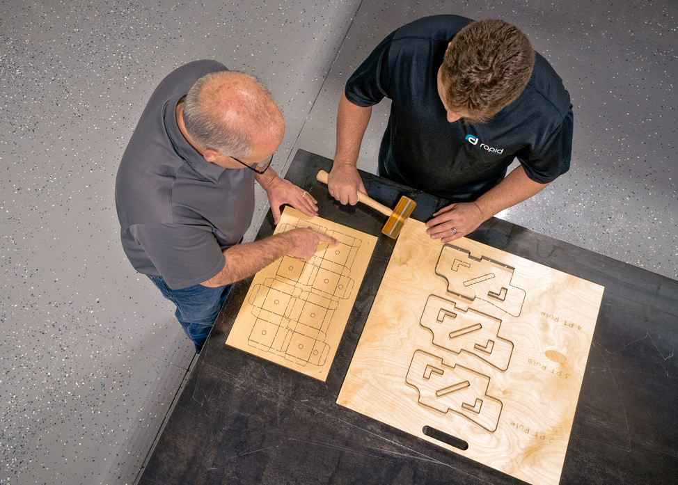 Custom cut shapes in square of black foam